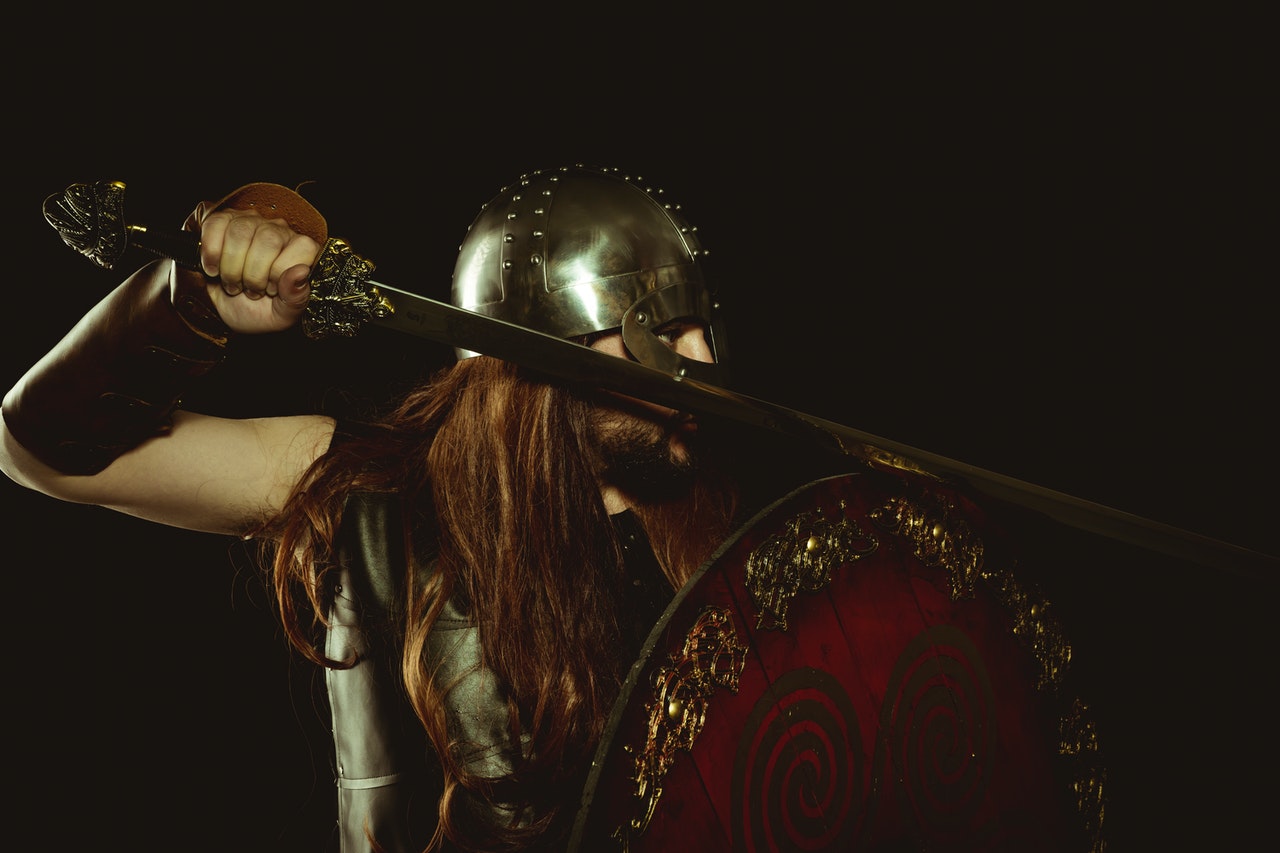 Photo by Fernando Cortés: https://www.pexels.com/photo/man-in-viking-warrior-costume-holding-sword-and-armor-10068866/