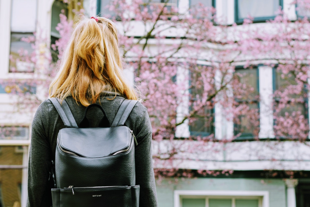 Photo by Tim Gouw: https://www.pexels.com/photo/woman-wearing-backpack-standing-in-front-building-443417/